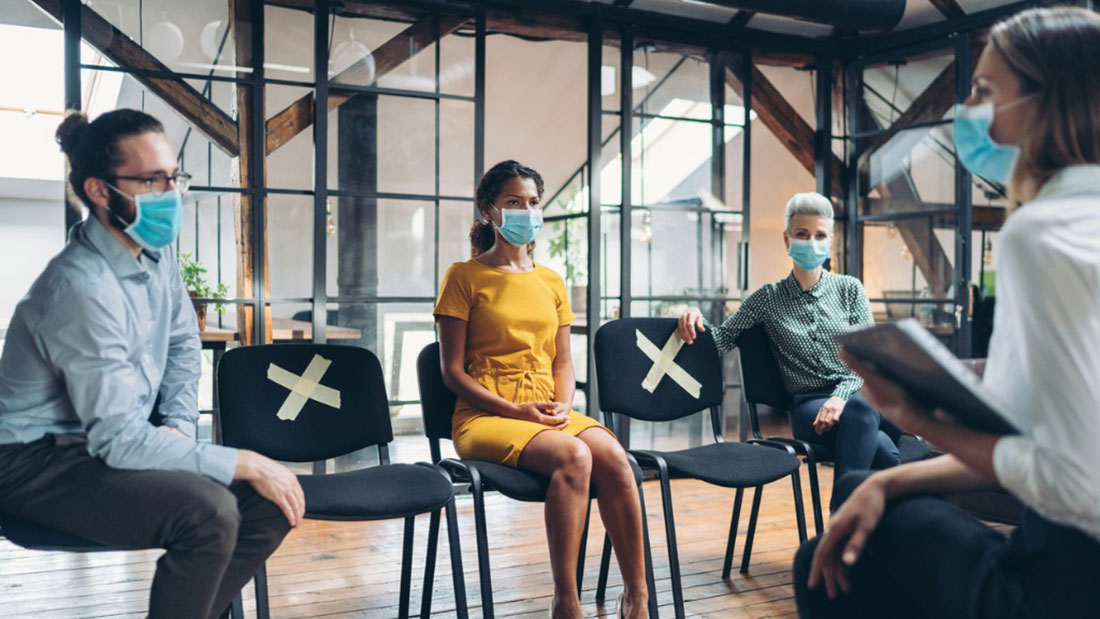 business people meeting with masks